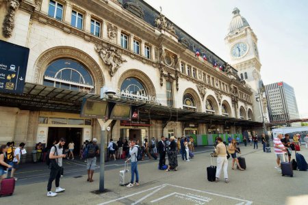 Photo for PARIS, FRANCE - Exterior view of the historic Gare de Lyon train station, built for the 1900 Paris World Exposition. It includes the landmark Tour de l'Horloge clock tower. - Royalty Free Image