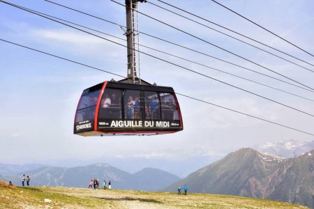 Photo for Chamonix, France -  June 21, 2023: Beautiful view of the cable car near Aiguille du Midi mountain in Fracne - Royalty Free Image
