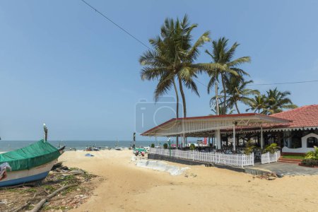 Photo for Benaulim Sunny Beach is a popular seaside destination located in the Indian state of Goa. The beach is known for its golden sands and clear blue waters, making it an ideal spot for visitors. - Royalty Free Image
