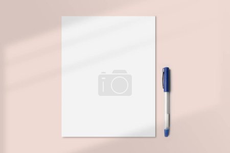 Photo for Blank paper with pen on beige background. Realistic A4 paper flatlay mockup with a pen. Portrait paper A4 International Paper Size mockup top view - Royalty Free Image