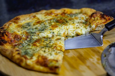 Photo for Traditional  four cheese pizza with parmesan, gorgonzola, mozzarella and provolone - Royalty Free Image