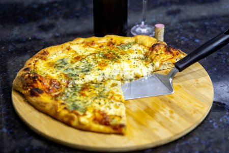 Photo for Real four cheese pizza with parmesan, gorgonzola, mozzarella and provolone - Royalty Free Image