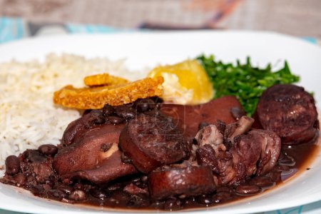 Photo for Traditional Brazilian feijoada served on plate - Royalty Free Image