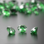 Green Diamond Group on Glossy Background Soft Focus 3d illustration