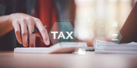 Photo for Effective tax deduction planning for individuals and companies paying tax rates ,Annual tax deduction planning concept ,Calculate business balance to reduce taxes ,Individual income tax - Royalty Free Image