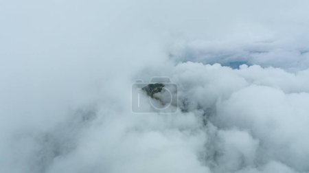 Aerial photographs were taken with a latest generation drone above dense gray clouds. Sky above the clouds and wonderful landscape photo
