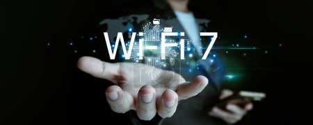 Businessman is showing concept of future technology Wi-Fi 7 and internet connection network with AI as controller. A graphic floated in the air on his hand. Data center network concept.