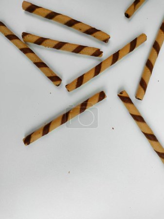 Crispy chocolate cream filled wafer roll sticks isolated on white background