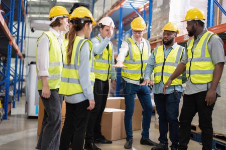 Photo for Diversity group of worker in warehouse stand round hand gathering boost up team morale - Royalty Free Image
