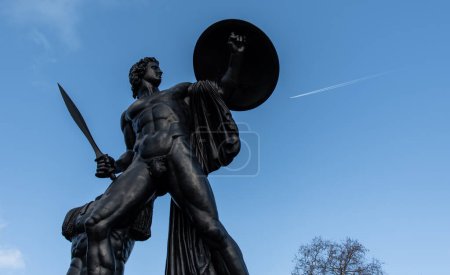 Photo for London, UK - 2023: 18ft statue of Achilles, the Greek hero of the Trojan War commemorating the soldier and politician, Arthur Wellesley  near the Queen Elizabeth Gate at Hyde Park Corner. - Royalty Free Image