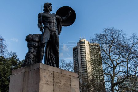 Photo for London, UK - 2023: 18ft statue of Achilles, the Greek hero of the Trojan War commemorating the soldier and politician, Arthur Wellesley  near the Queen Elizabeth Gate at Hyde Park Corner. - Royalty Free Image