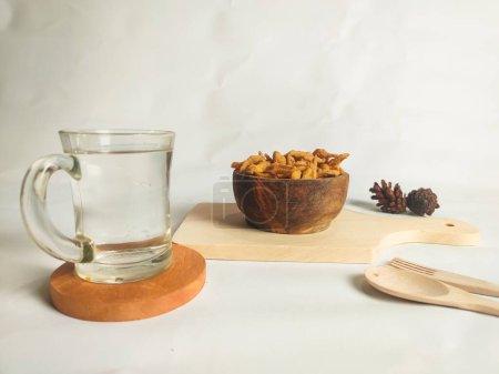 photography of cimi-cimi snacks with a glass of water