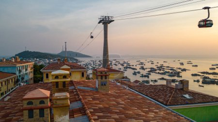 Photo for Picturesque view of Sunset Town, Cable Car, and fishing village on Phu Quoc Island at sunset, Vietnam. - Royalty Free Image