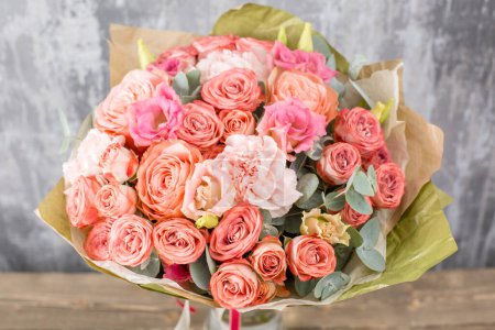Photo for Floral shop concept. Small Beautiful bouquet of mixed flowers. Beautiful fresh cut bouquet. Flowers delivery. High quality photo - Royalty Free Image