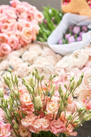 Photo for Many different colors. Showcase. Background of mix of flowers. Beautiful flowers for catalog or online store. Floral shop and delivery concept. Top view. High quality photo - Royalty Free Image