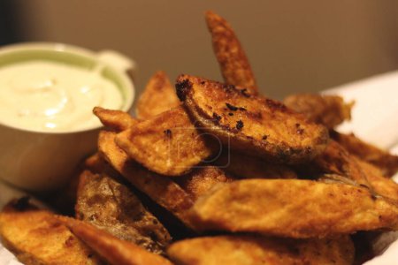 Embark on a culinary journey as we unveil the art of frying potato wedges to crispy perfection