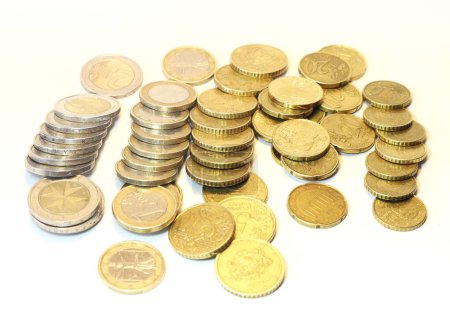 Isolated piles of euros stand as a representation of financial assets amidst economic flux