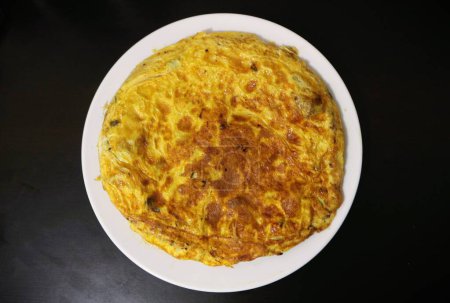 Indulge in the wholesome goodness of a nutritious courgette omelette, perfectly crafted to cater to various dietary preferences including keto