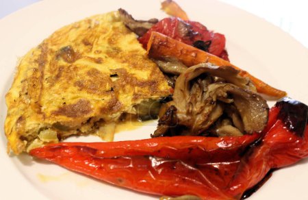 Photo for Savor the delightful combination of oven-roasted veggies paired with a fluffy omelette - Royalty Free Image
