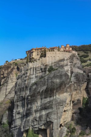 Photo for Discover the divine beauty and spiritual allure of the churches that grace the cliffs of Meteora, Greece - Royalty Free Image