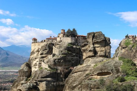 Photo for Discover the divine beauty and spiritual allure of the churches that grace the cliffs of Meteora, Greece - Royalty Free Image