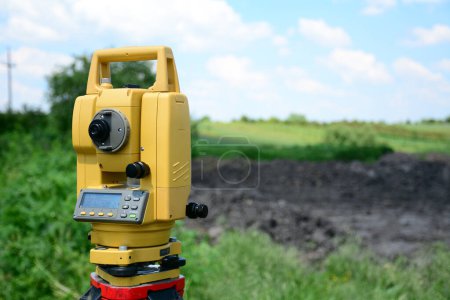 Photo for Outdoor topographic measurements and positioning with total station and prism - Royalty Free Image