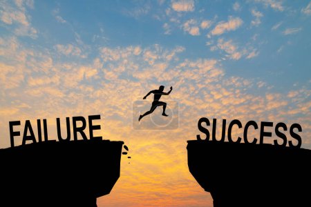 Photo for Man jump across text failure to success over cliff on sunset background concept for being successful in job and business. - Royalty Free Image