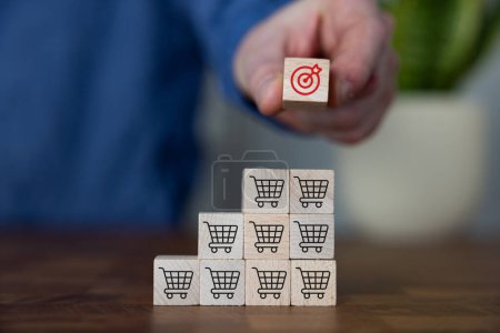 Sale volume increase make business success, Flips cube with icon goal and shopping cart symbol.