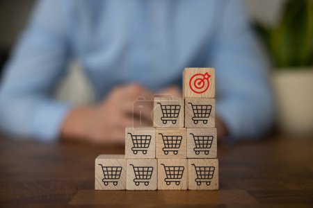 Sale volume increase make business success, Flips cube with icon goal and shopping cart symbol.