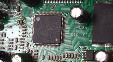 Close up of a microchip circuit. Digital electronic or high tech concept cover image or background. 