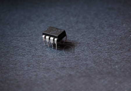 Photo for Eight pins semiconductor chip. Close up of a IC chip. - Royalty Free Image