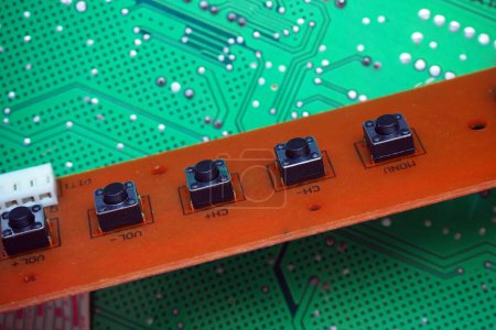 Photo for Tact buttons on an electronic circuit board. Tactile switches in a row. - Royalty Free Image
