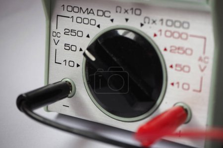 Photo for Close up of  a voltmeter commutator. Analog multimeter panel. DC voltage level. - Royalty Free Image