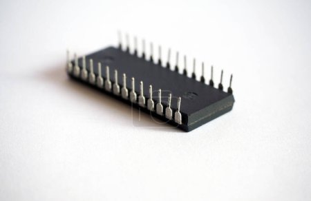 Photo for 28-legged integrated circuit isolated on a white. Semiconductor electronic component. - Royalty Free Image