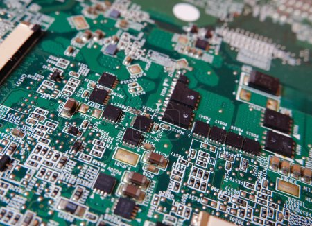 Photo for High-tech background with circuit board texture. Semiconductor surface mount components and connection lines on the electronic circuit. - Royalty Free Image