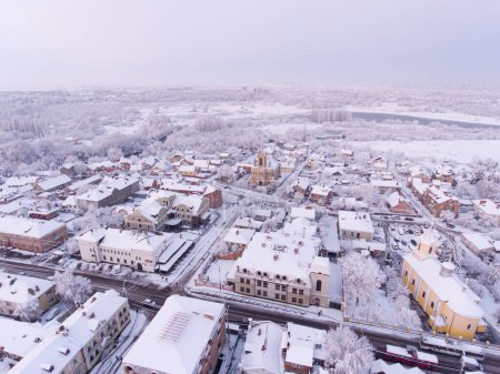 Winter morning view of the old historical part of the city of Lutsk. Ukraine. Lutheran Church. Concept of old architectural buildings. Aerial view.
