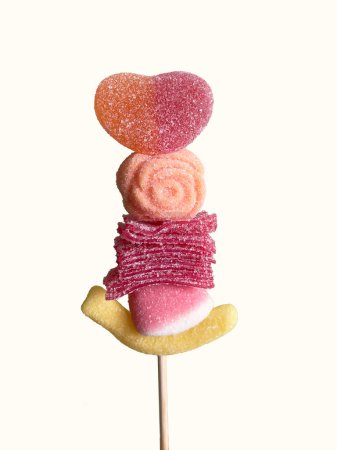  Gelatin candies of different shapes on a stick. High quality photo
