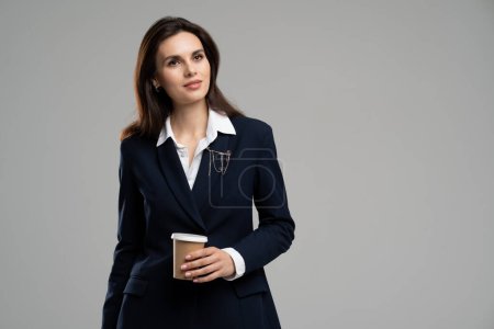 Photo for Creative photo portrait of confident young business lady wear formal suit ceo director marketing company hold paper cup coffee. Woman drink latte. High quality photo - Royalty Free Image