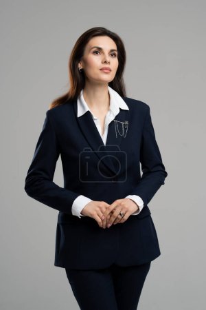 Photo for Vertical photo of young businesswoman brunette account manager formal wear confident hands together look copyspace. Nice pretty girl inspired leader. High quality photo - Royalty Free Image