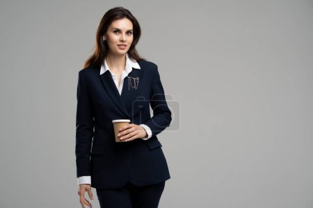Photo for Photo portrait of nice attractive young girl wear stylish expensive suit posing copyspace takeaway coffee break. Beautiful businesswoman teatime. High quality photo - Royalty Free Image