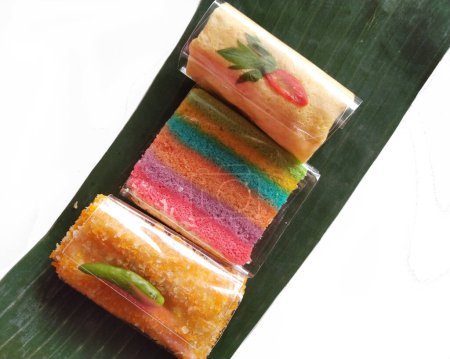 Assorted colorful Indonesian traditional cakes isolated on white background.