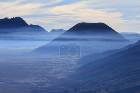 Photo for Foggy mountain background of Bromo Tengger Semeru National Park, Indonesia - Royalty Free Image