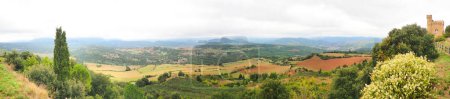 Photo for Panoramic view of the countryside from the village of Rennes-Le-Chateau, in Aube, Occitanie, not far from Perpignan, where Abb Saunire is said to have discovered a fabulous treasure - Royalty Free Image