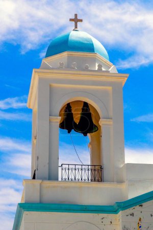 Photo for Bell tower of the Orthodox Church of Saint George in the old town of Chora sur Andros, famous Cyclades island in the heart of the Aegean Sea - Royalty Free Image