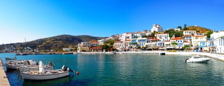 Photo for Panoramic view of the fishing port of Batsi, on the island of Andros, famous Cyclades island in the heart of the Aegean Sea - Royalty Free Image