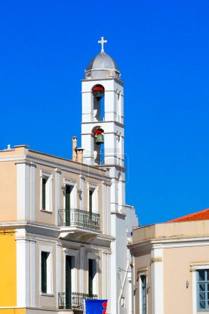 Photo for Bell tower of the Saint Nicholas Catholic Church, in Tinos (Greece), famous and magnificent island of the Cyclades archipelago in the heart of the Aegean Sea, - Royalty Free Image
