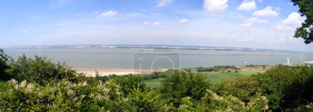 Photo for Beautiful panoramic view of the splendid bay of the Somme from the heights of the village of Saint Valery sur Somme in the Hauts-de-France region, on the coast of the English Channel - Royalty Free Image