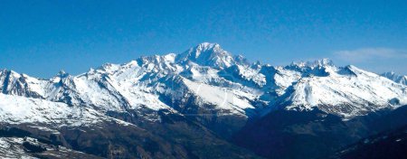 panoramic view of the southern slope of the Mont Blanc massif (4810 m), the highest peak in Europe, from the famous La Plagne 2000 ski resort  in the heart of the French Alps in the Tarentaise valley 