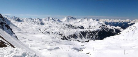 Panoramic view of the ski slopes of the famous La Plagne-Bellecote ski resort in the heart of the French Alps in the Tarentaise valley at the foot of Mont Blanc