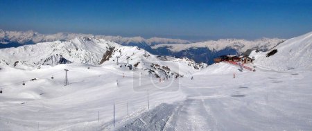 Photo for Panoramic view of the ski slopes of the famous La Plagne-Bellecote ski resort in the heart of the French Alps in the Tarentaise valley at the foot of Mont Blanc - Royalty Free Image